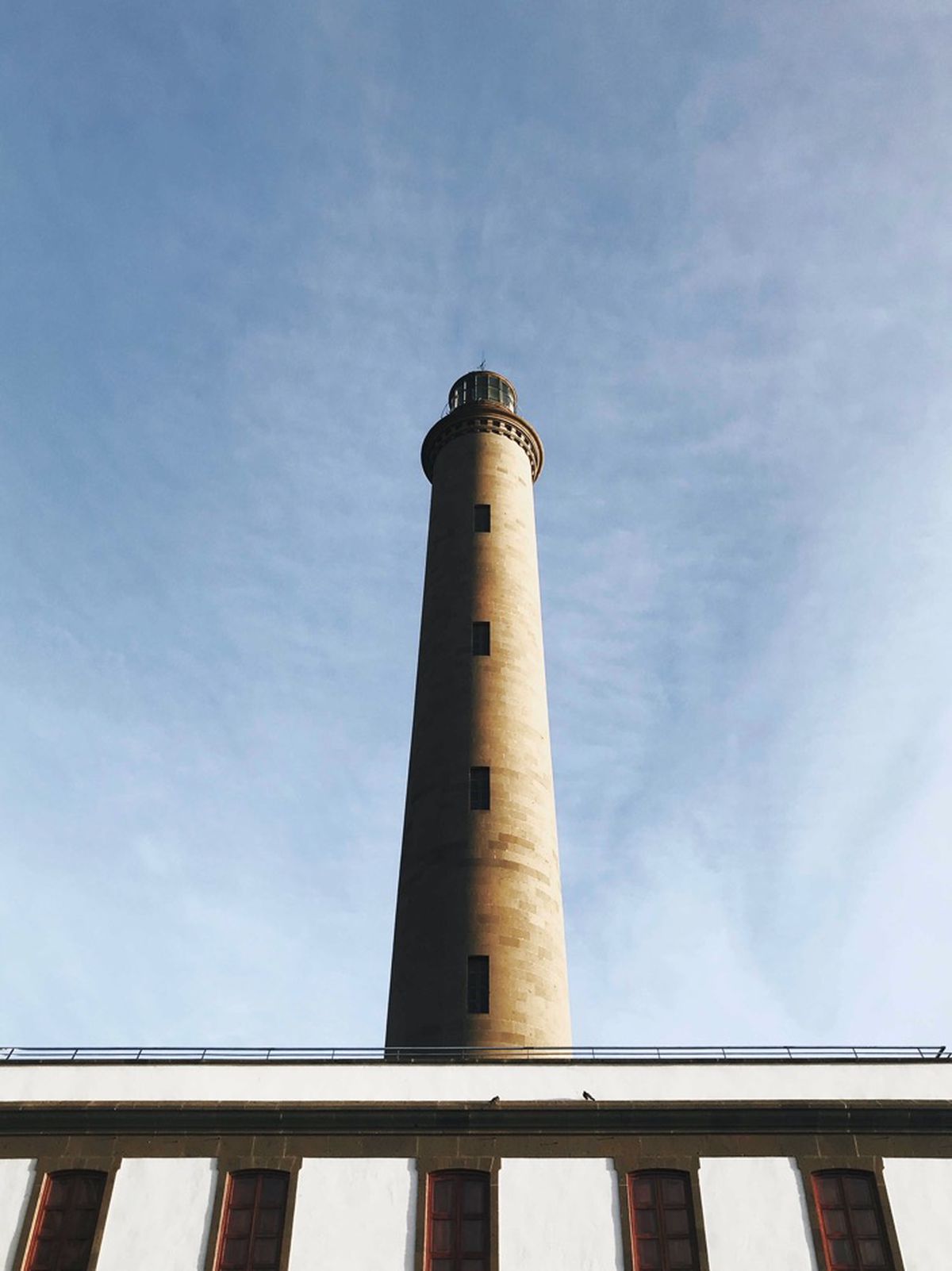 Lighthouse against a pale sky