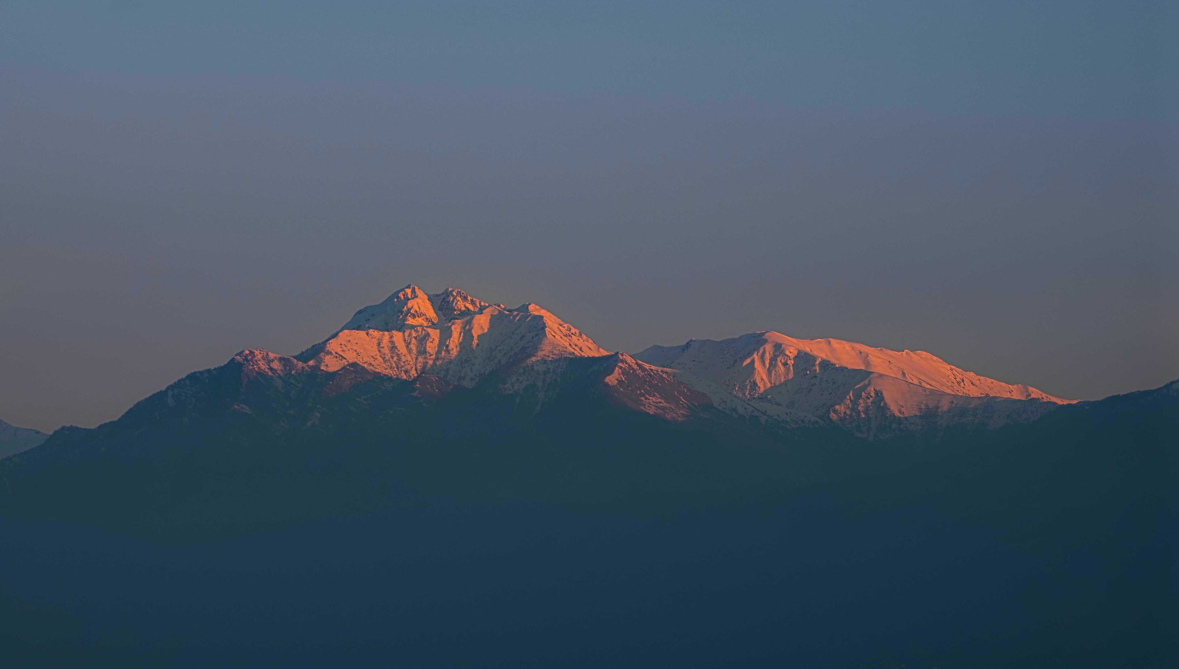 Mountain panorama in the warm light of sunset